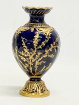 A Royal Crown Derby cobalt blue and gilt porcelain vase. Circa 1891-1940. 18cm