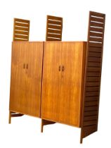 A Mid Century teak double wardrobe Ladderax designed by Robert Heal for Staples. 1960's.