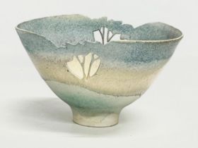 A Mollie Hillam Fulneck pierced studio pottery bowl. 18.5x16x11cm