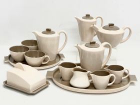 A collection of 1960’s Mid Century Poole Pottery tea and coffee ware.