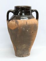 A large vintage glazed terracotta pot. 28x42cm
