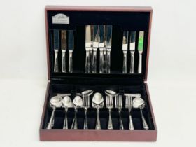 A George Butler of Sheffield canteen of cutlery. Made in France. Case 39x29x9cm