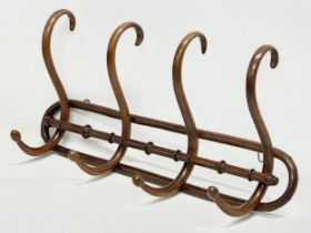 An early 20th century Bentwood hat and coat rack. 73x35cm