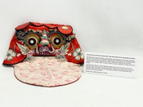 A Qing Dynasty Chinese silk ‘Tiger Wind’ baby hat. Circa 1900-1910.