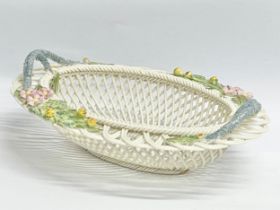 A Limited Edition Belleek pottery woven Henshall Annual Basket. 21x17x7cm