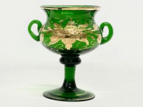 A late 19th century hand blown Bristol Green vase in the manner of Moser. 14x11x13.5cm