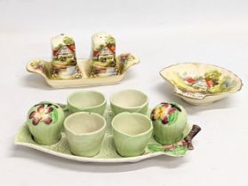 2 pottery condiment sets, by Royal Winton and Carlton Ware.