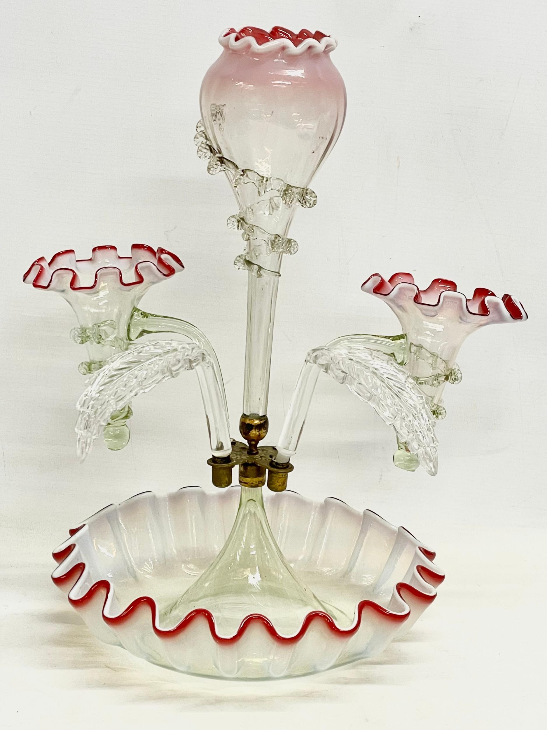 A Victorian Vaseline Glass epergne. 27x42cm.