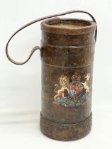 A World War 1 (WWI) leather bound canon shell carrier. 39cm