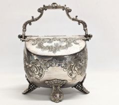 A late Victorian ornate silver food warmer from Riddels, Belfast. 19x24cm