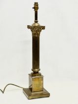 A large vintage Corinthian style brass table lamp. 64.5cm