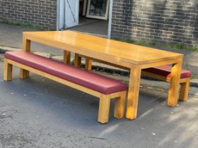 A large heavy oak dining table and 2 matching benches. 250x100x76cm