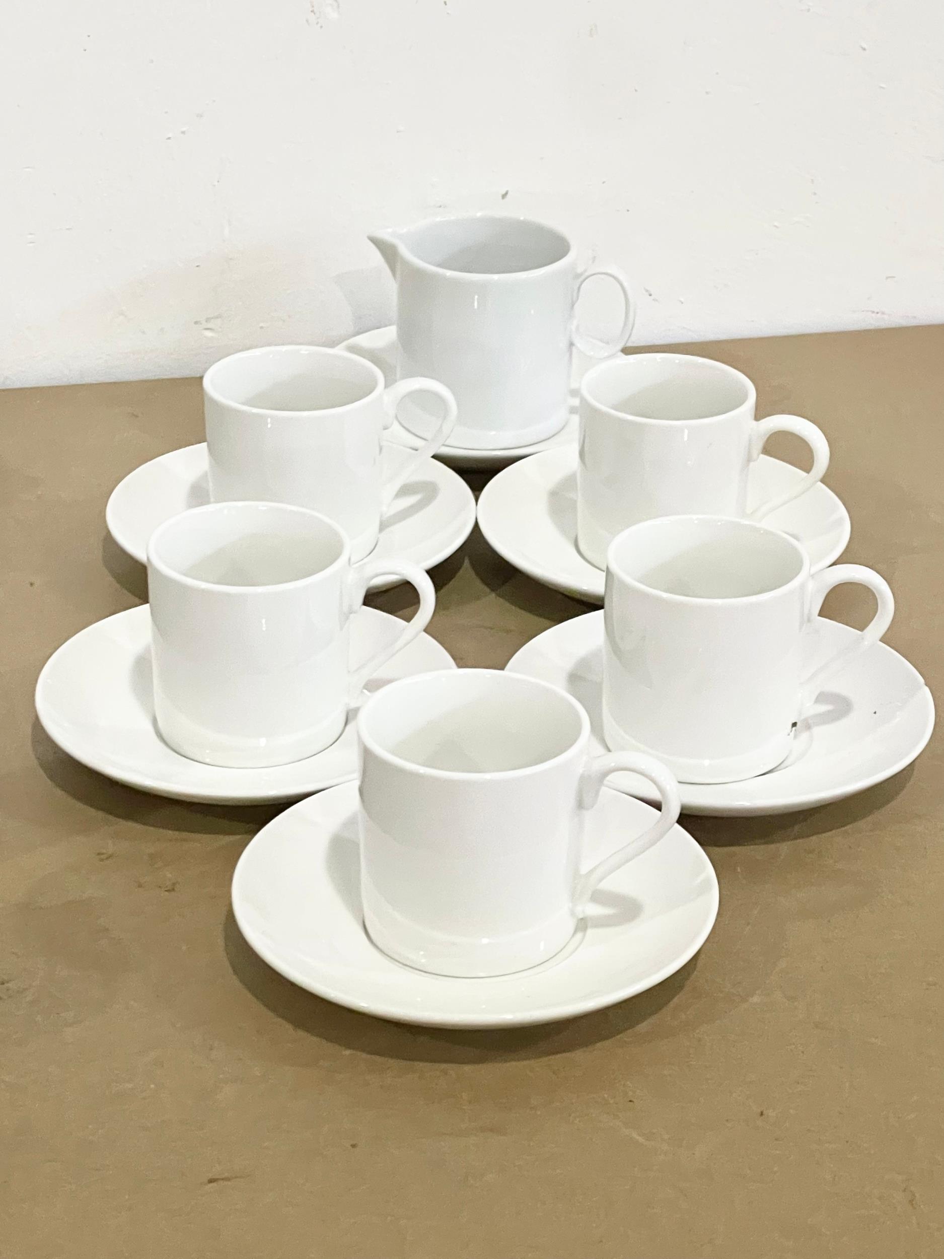 A collection of designer coffee cups and saucers. 11 piece Maxwell Williams coffee set, with a - Image 9 of 11