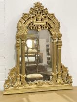 An ornate framed mirror. 68x84cm