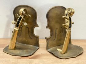 A pair of brass bookends.