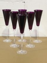 A set of 6 large purple wine glasses. 27cm