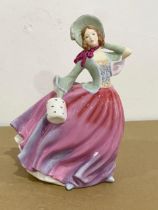 A Royal Doulton ‘Autumn Breeze’ figurine. 17.5cm