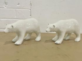 A pair of large pottery polar bears. 25cm