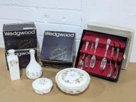 A sundry lot including 4 pieces of Wedgwood pottery with 3 original boxes. With a set of cutlery.