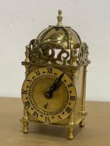 A Smiths Industries brass clock. 17cm