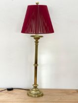 A tall modern heavy brass table lamp. 87.5cm