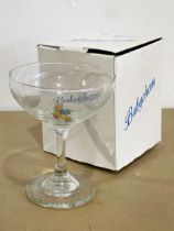A vintage Babycham cocktail glass in box.