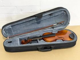 A violin in case.