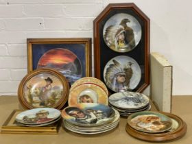 A quantity of collectables plates.