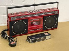 A Grundig RR 345 Stereo and an ITT Magicflash Telephoto Camera.