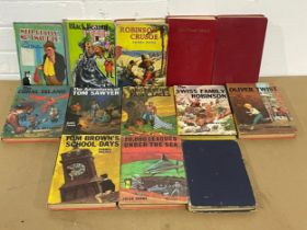 A collection of vintage books. The Coral Island, Black Beauty, Oliver Twist etc