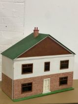 A vintage dolls house. 69x30x63cm