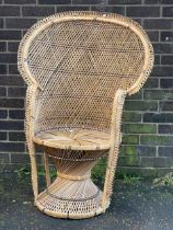 A vintage Wicker Peacock chair.