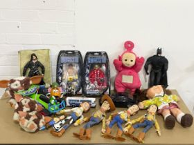 A collection of toys. Toy Story, The Lord of the Rings, Batman, Gremlins, Rocky III etc.