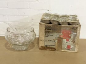 A vintage Jeannette punch bowl and cups in box. Bowl measures 29x19cm