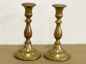 A pair of vintage brass candlesticks. 20cm