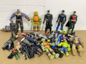A collection of action figures. DC, Marvel, Batman, Superman, Star Wars etc