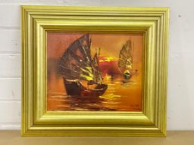 A signed oil painting of Chinese ships. 45x40cm