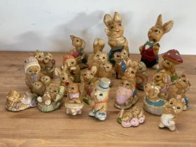 A collection of Pepiware rabbits and owls.