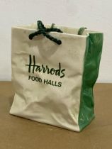 A Sylvac Ceramics Harrods bag.