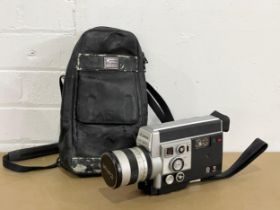 A vintage Canon Auto Zoom 814 Electronic camera.