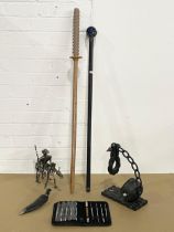 A sundry lot. A Gurkha knife, a Samurai style wooden sword, wall hanging candleholder, wizards