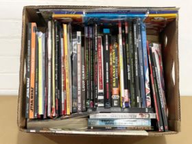 A collection of DC and Marvel comics and annuals.