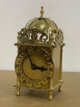 A Smiths Industries brass clock. 17cm