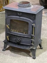 A multifuel cast iron wood burning stove. 41x28x60cm