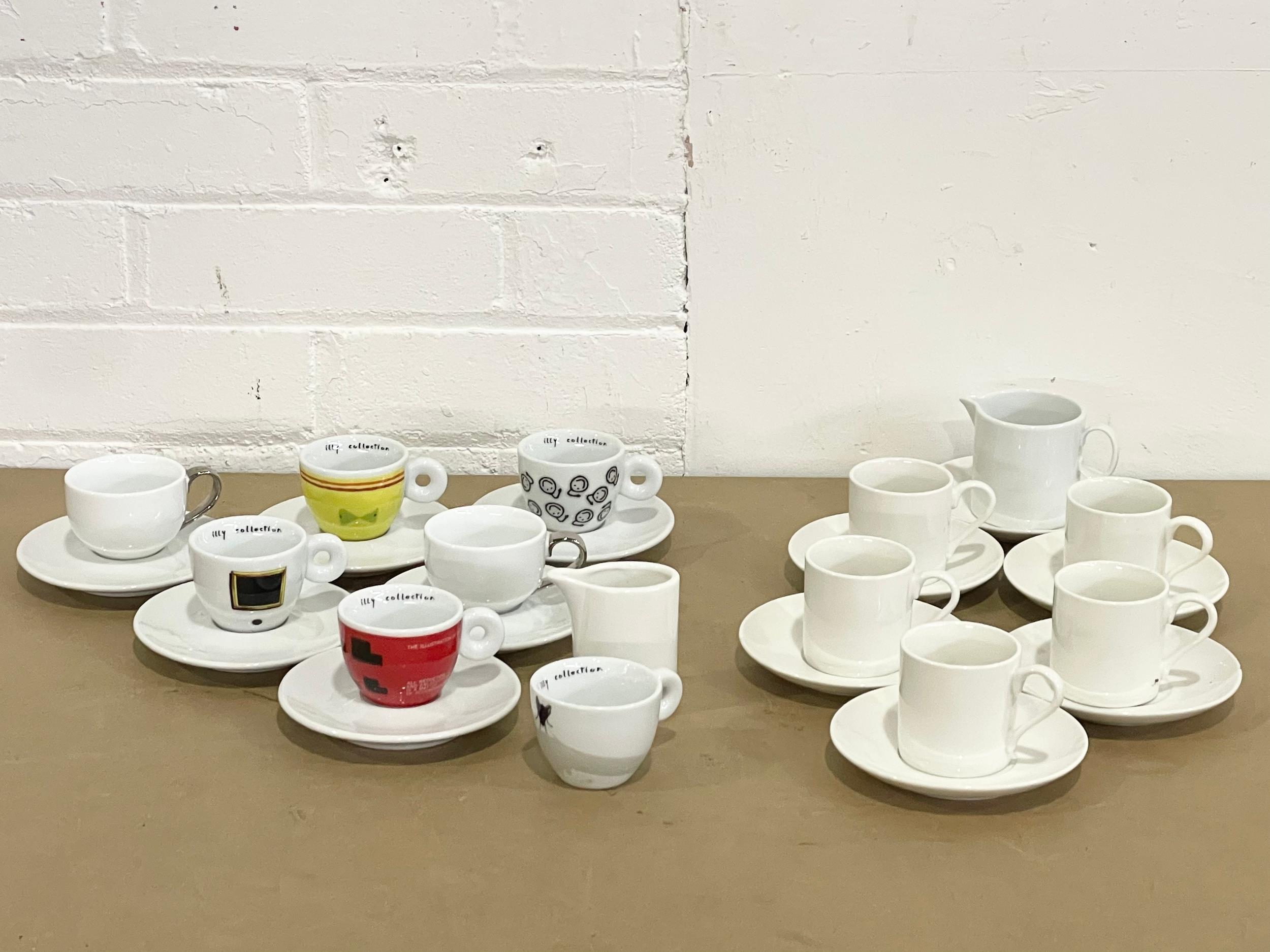 A collection of designer coffee cups and saucers. 11 piece Maxwell Williams coffee set, with a