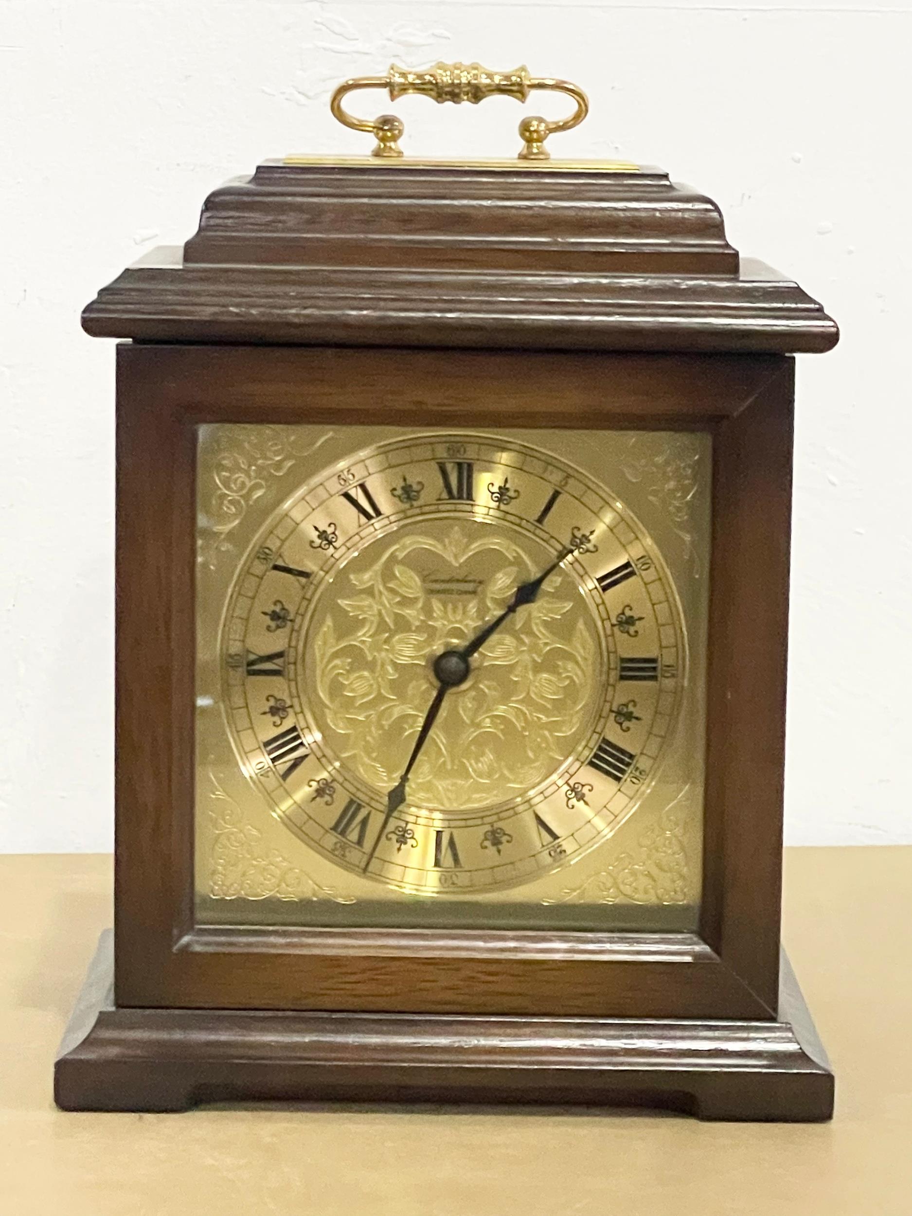 A brass faced mantle clock by Canterbury. 18x13x24cm