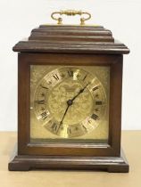 A brass faced mantle clock by Canterbury. 18x13x24cm