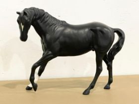 A Beswick horse. 24x17.5cm