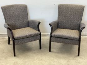 A pair of vintage Parker Knoll armchairs. Model 749/1014.