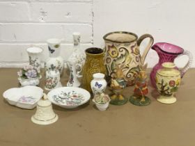 A collection of pottery. A Ruby Glass jug, West German vase, Wade hand painted jug, Aynsley